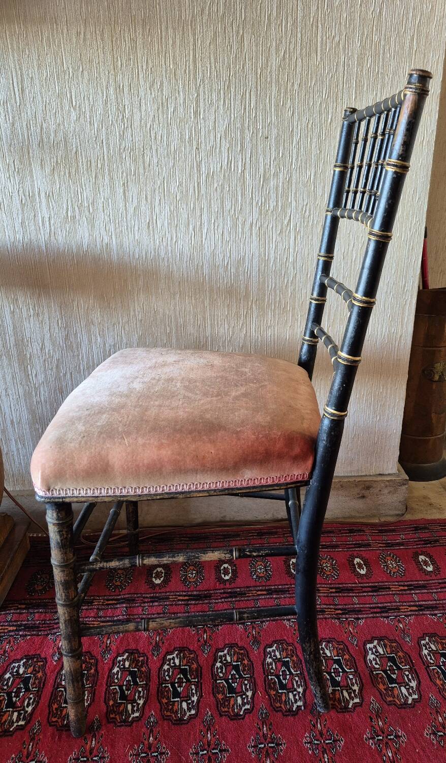 Small Napoléon III chair in black bamboo with a red velvet seat.
