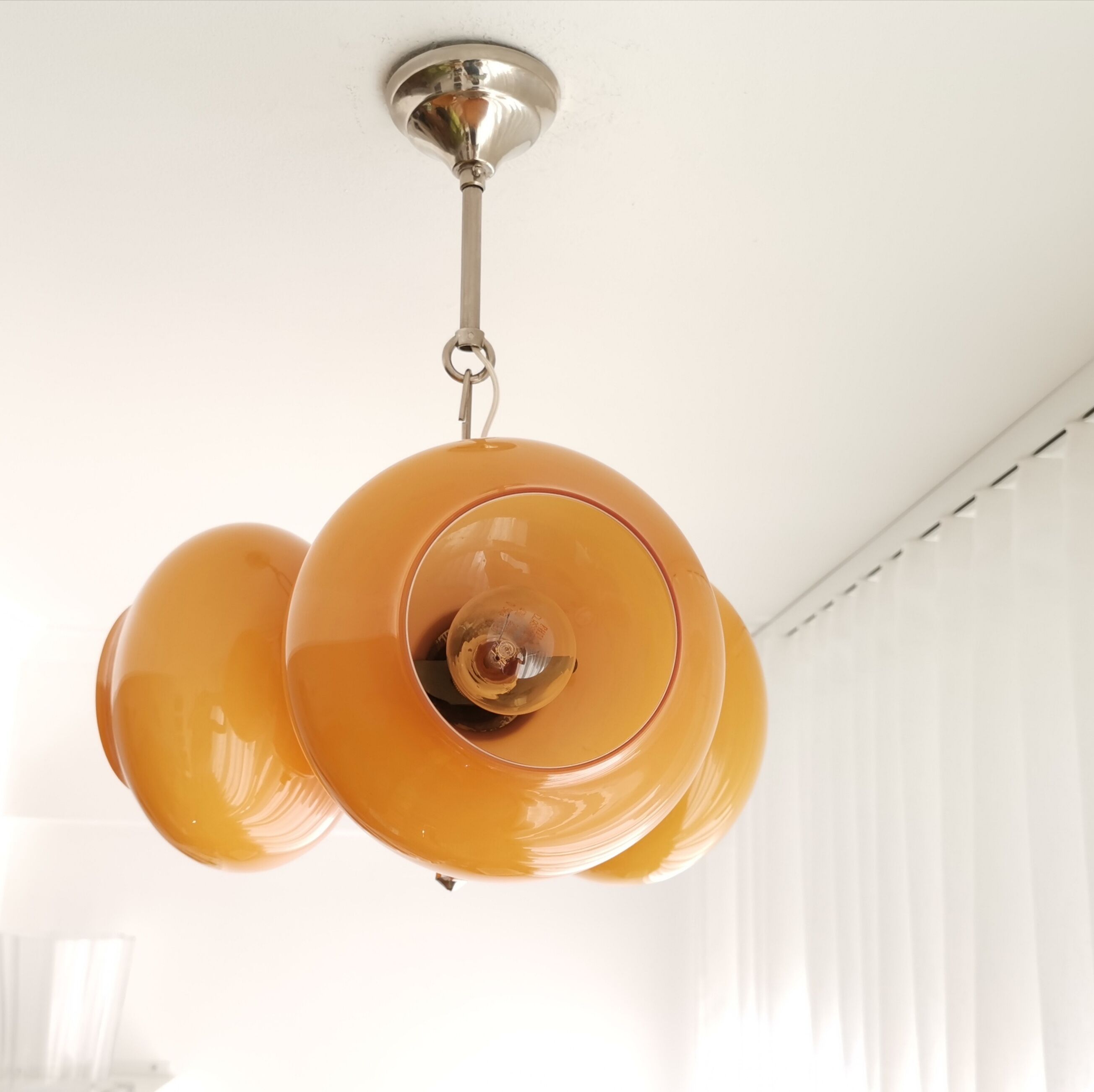 Vintage mid century modern 3-light orange glass chandelier