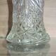 Vintage pressed glass vase, a decorative and elegant piece.