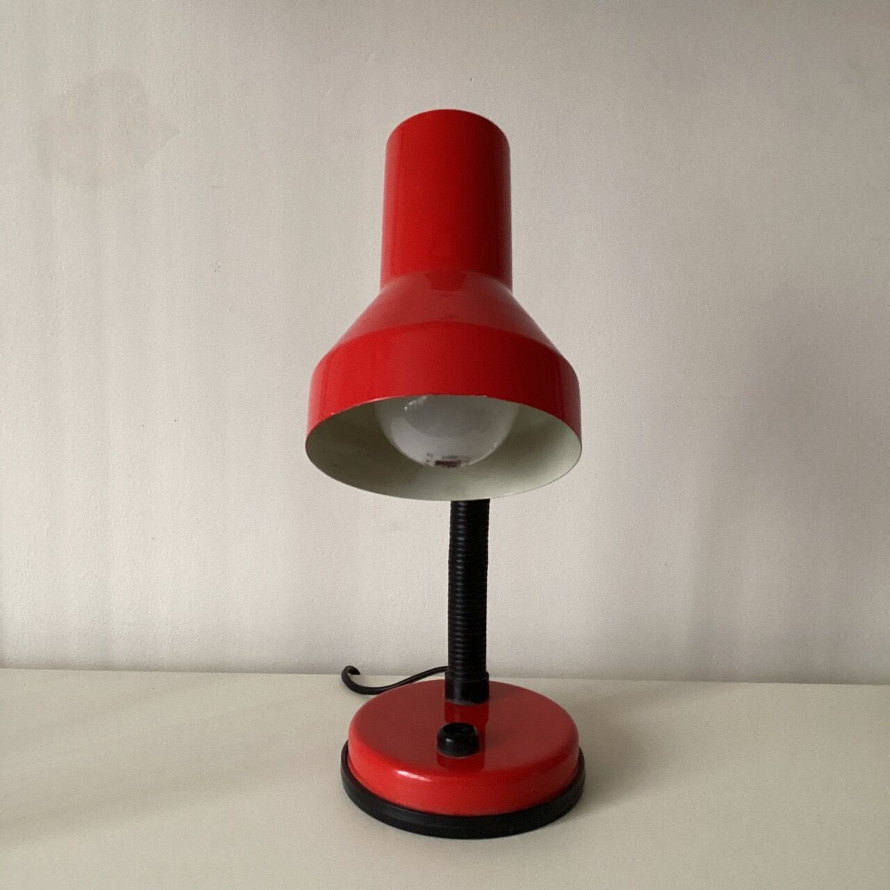 Red and black desk lamp