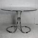 Table style Gastone Rinaldi, Italy, circa 1970. Chromed steel and smoked glass slab.