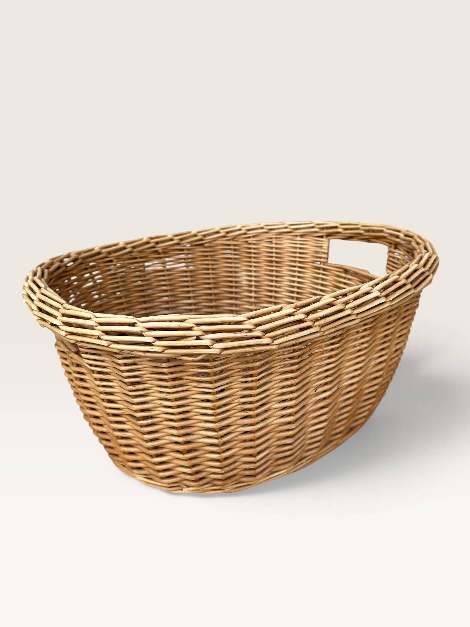 Woven blonde wicker basket