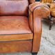 Paire de fauteuils club en cuir des années 1980