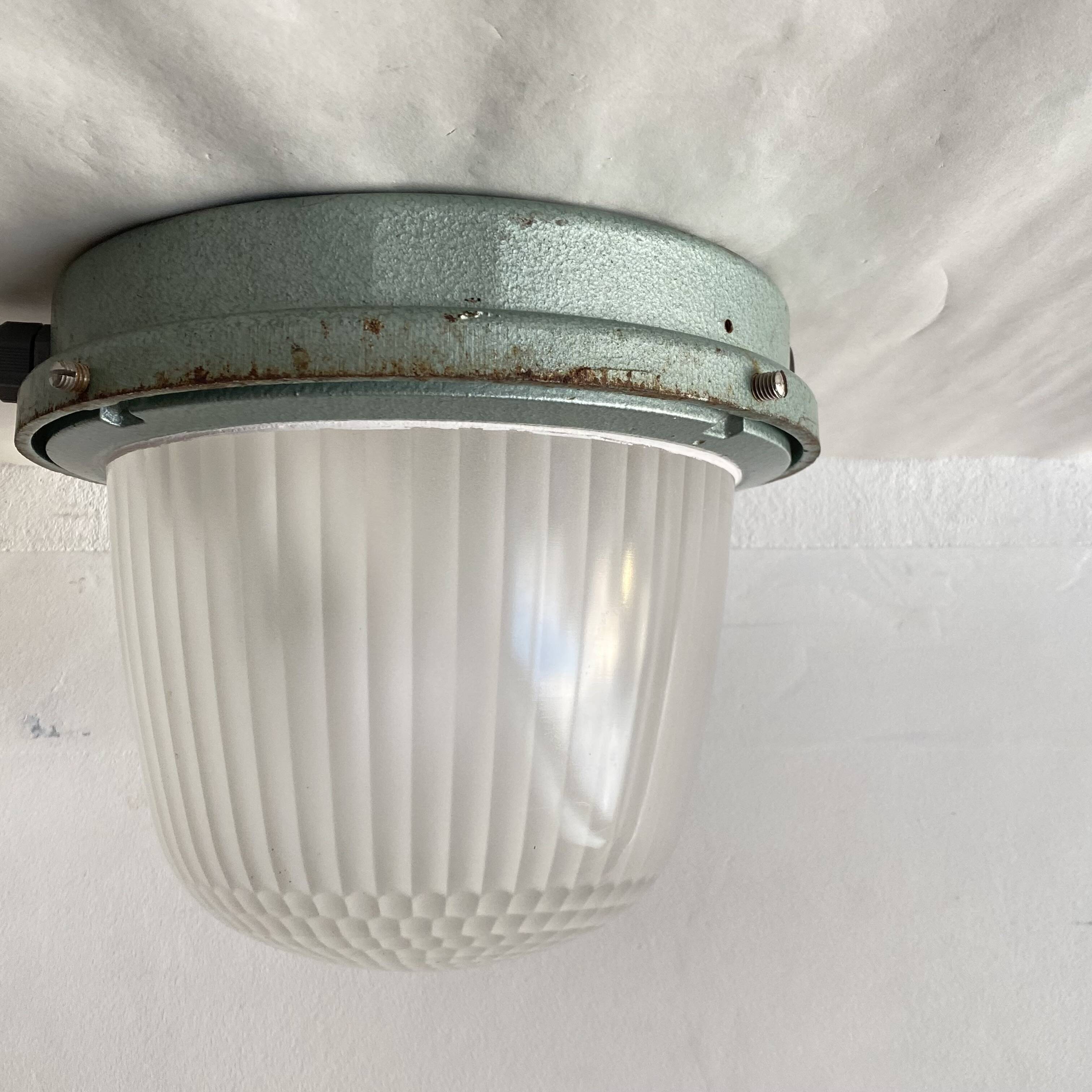 Large porthole wall light Holophane CE 200 glass and cast iron