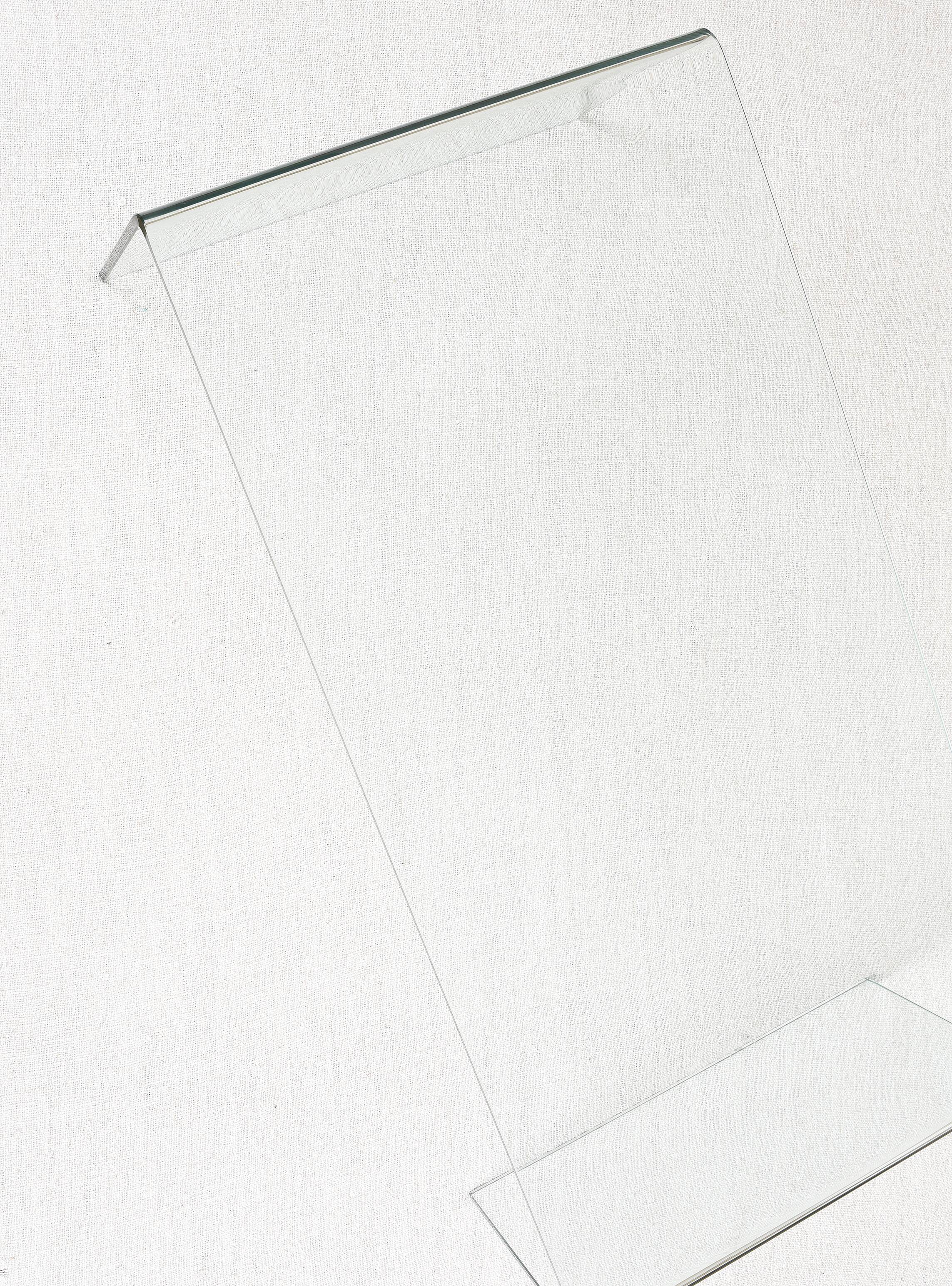 Transparent tempered glass coffee table.