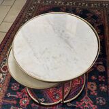 Pull-out table in marble and brass