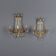 Antique wall sconces in gilded bronze with neoclassical motifs, 20th century.