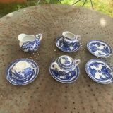 Porcelain tea set with dragon or cherry blossom motif