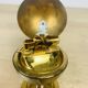 Vintage brass globe lighter