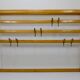 Grand coat rack Auböck Carl Mid-Century in beech with 8 brass hooks, 1950s.