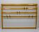Grand coat rack Auböck Carl Mid-Century in beech with 8 brass hooks, 1950s.