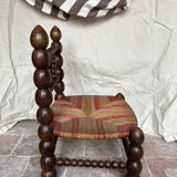 Turned wooden chair by Charles Dudouyt