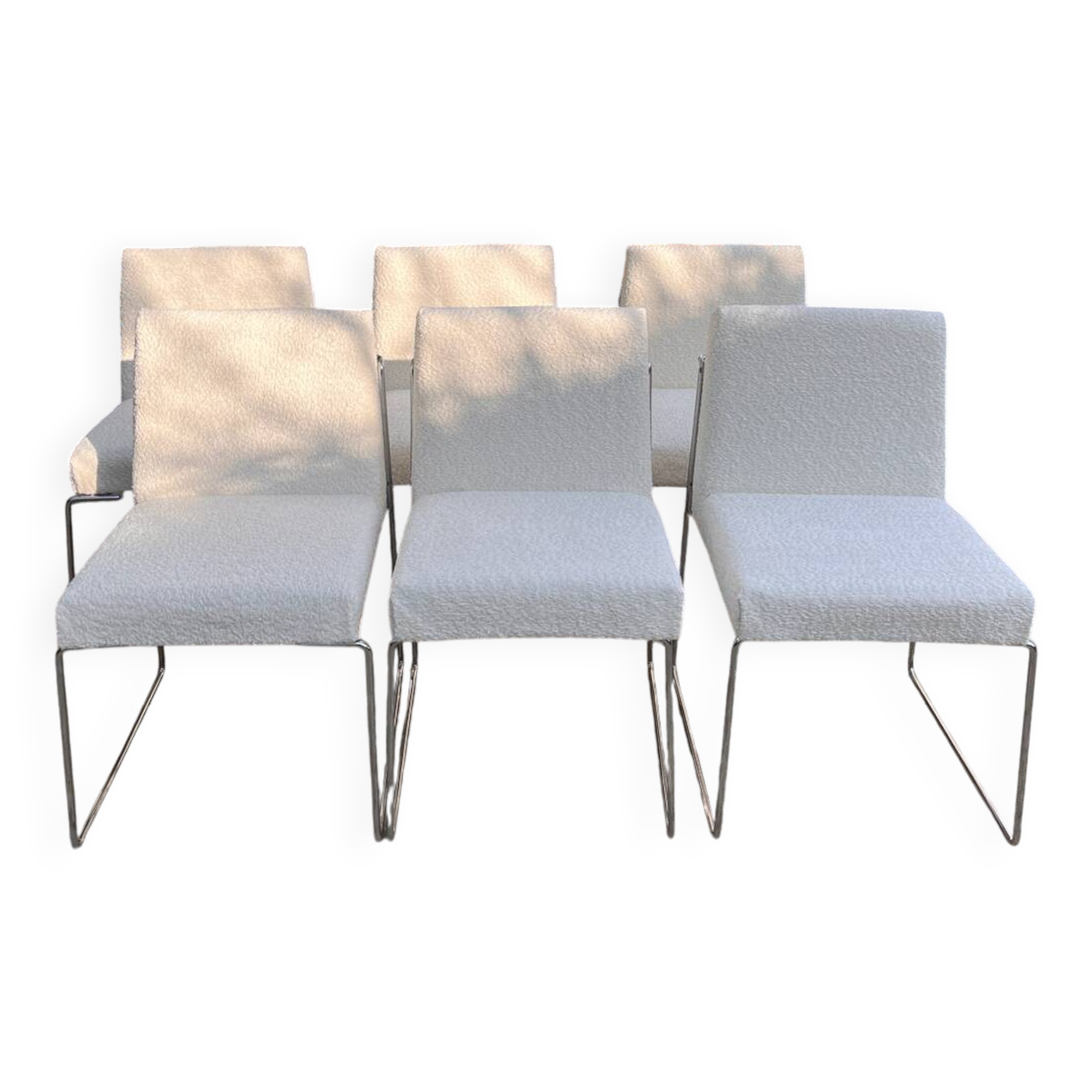 6 Paco Capdell chairs in metal and boucle fabric.