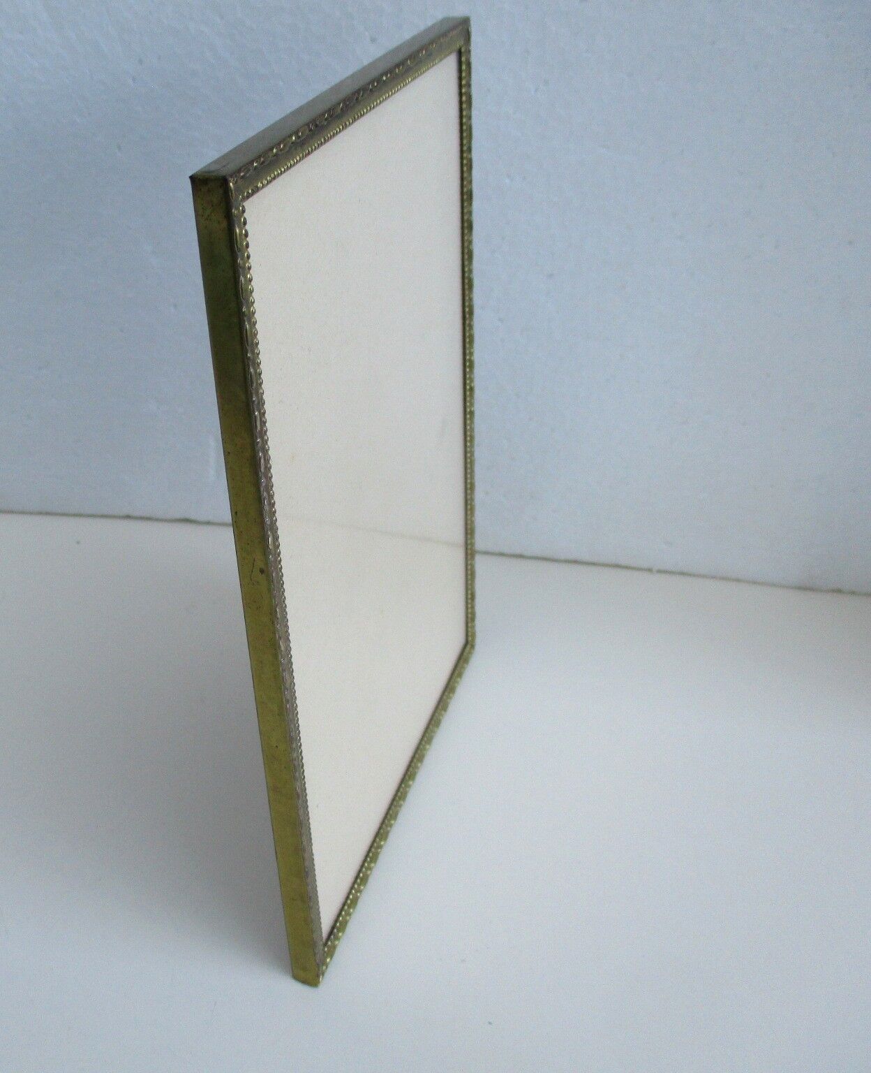 Vintage brass wall frame