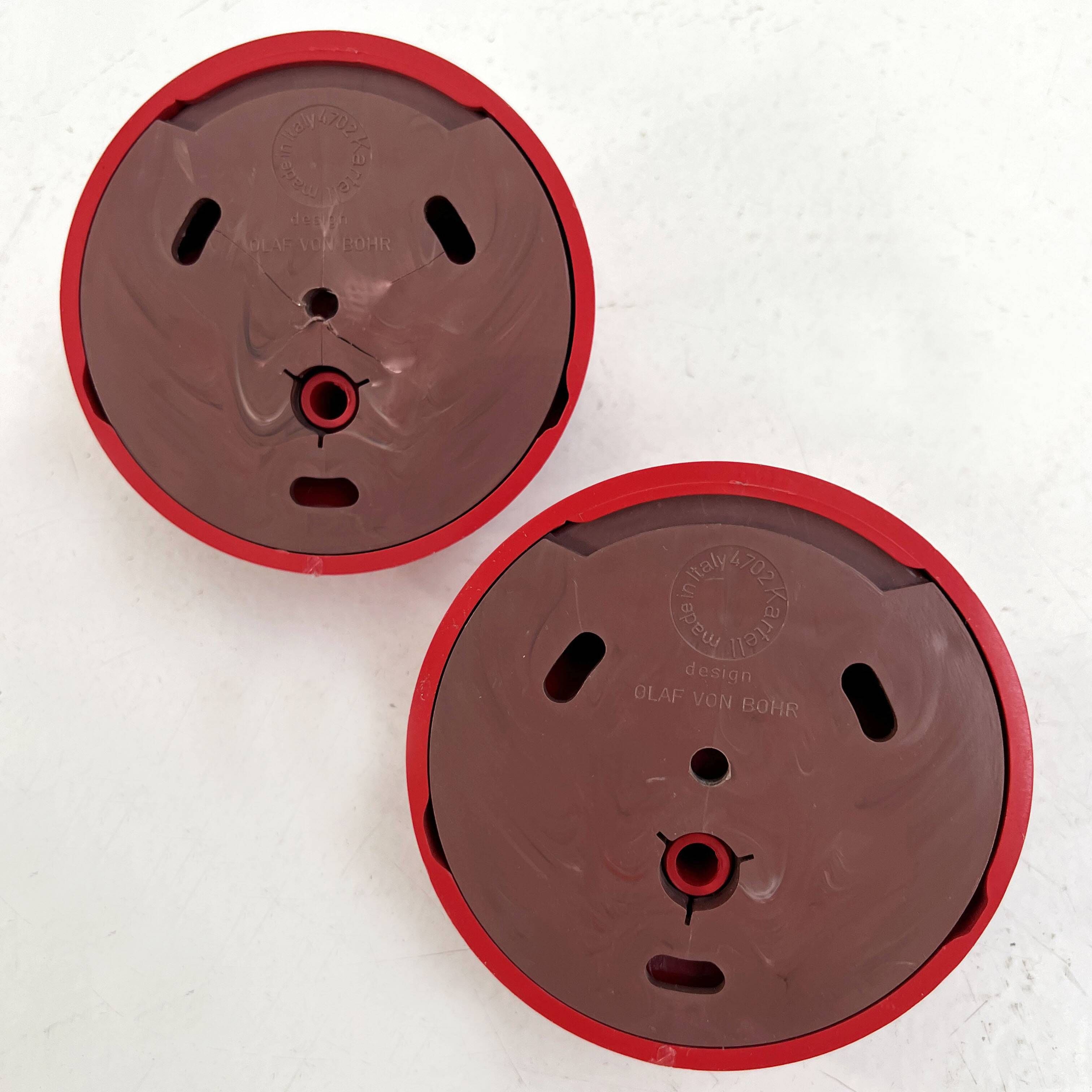 Set of 2 red "gancio 4702" coat hooks by olaf von bohr for kartell, 1970.