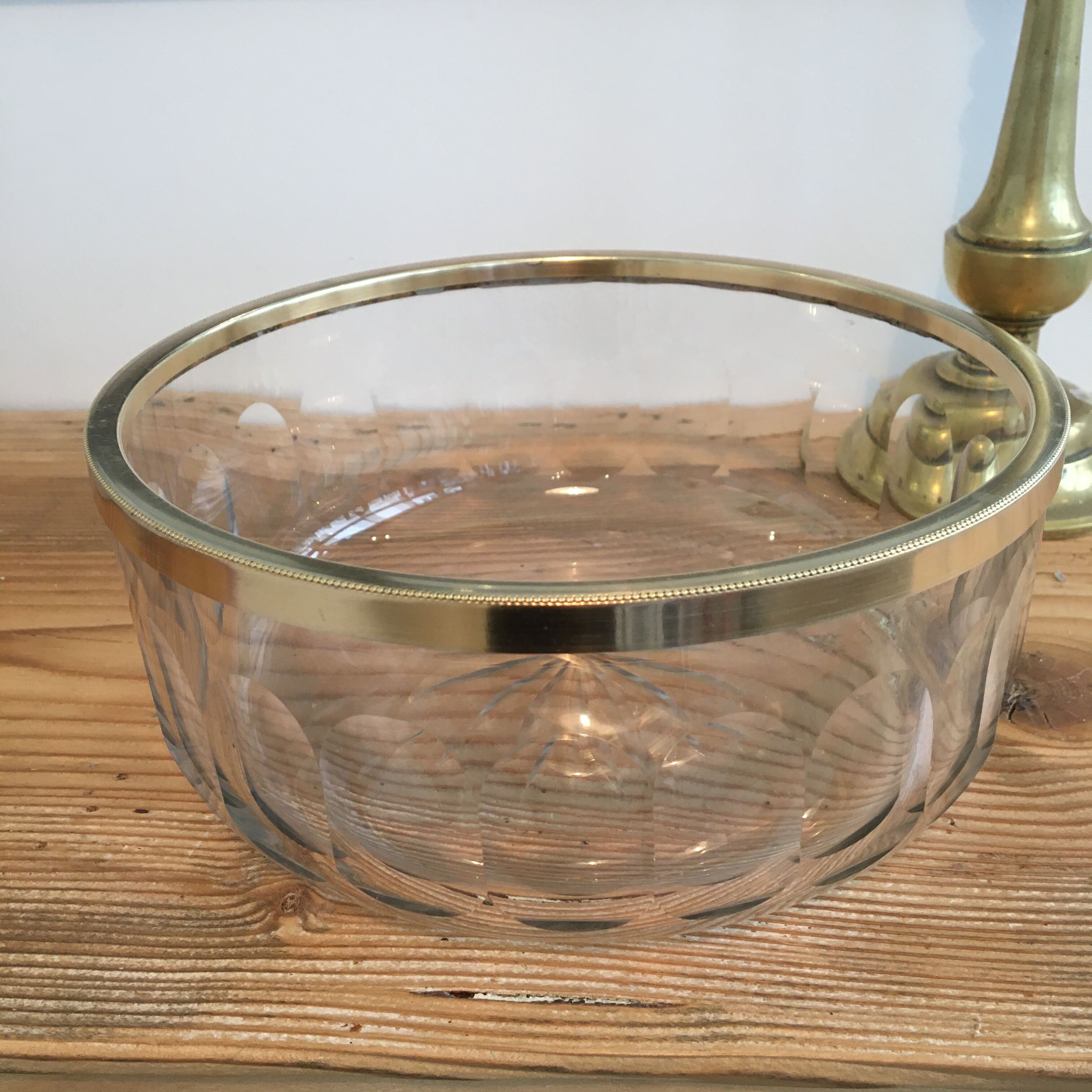 Crystal bowl trimmed surrounded gold metal