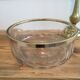 Crystal bowl trimmed surrounded gold metal