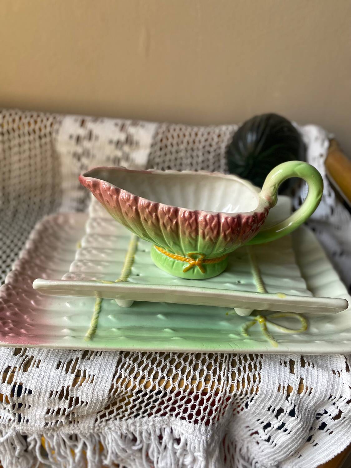 Asparagus dish and sauce boat in slip