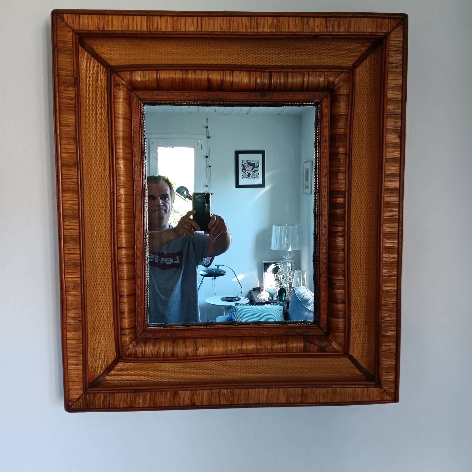 Wall mirror in rattan, wicker and wood