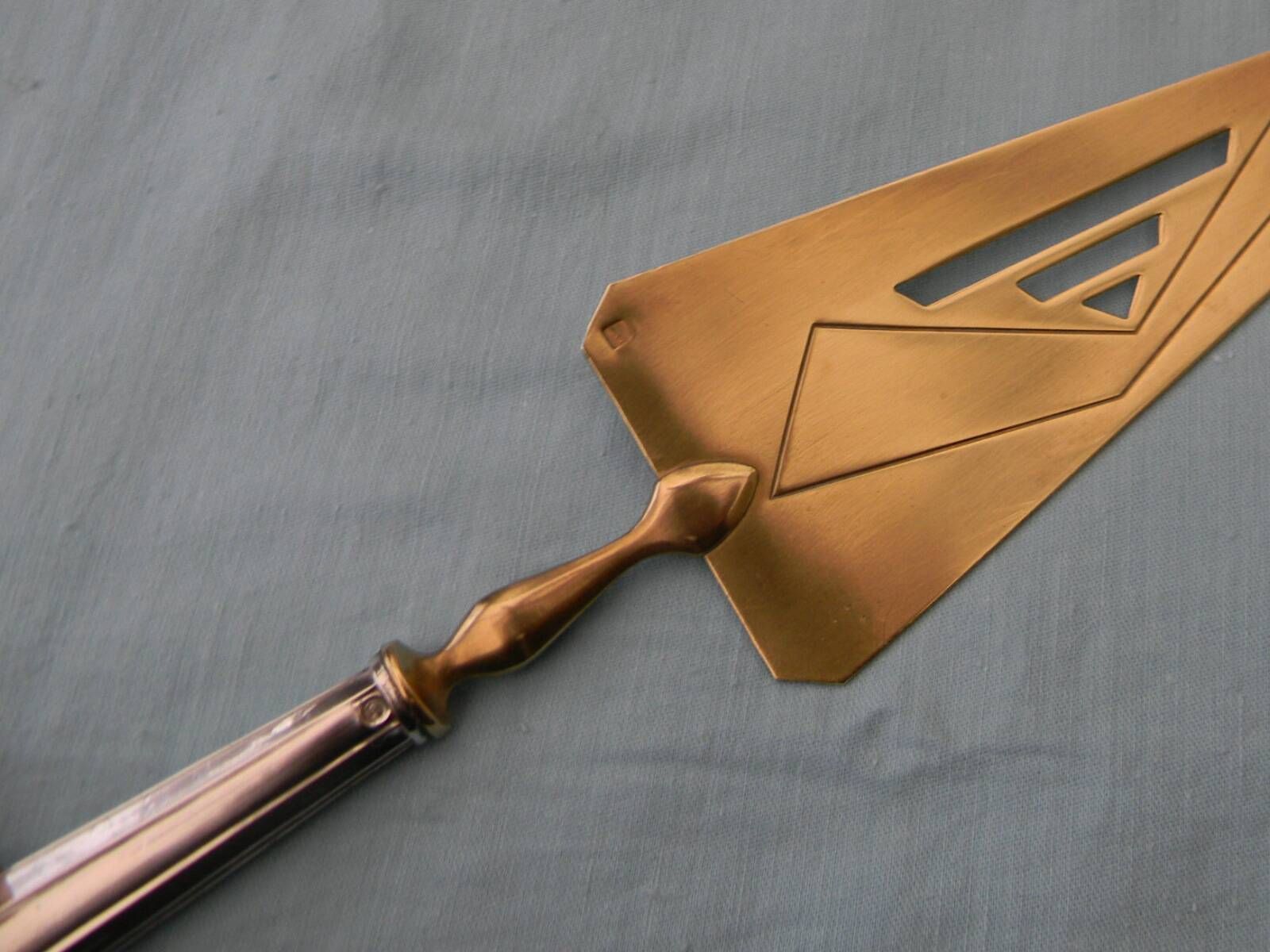 Art Deco pie server silver handle filled with Minerva hallmark.