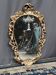 Miroir ancien en bois de style rococo. Noyer massif.