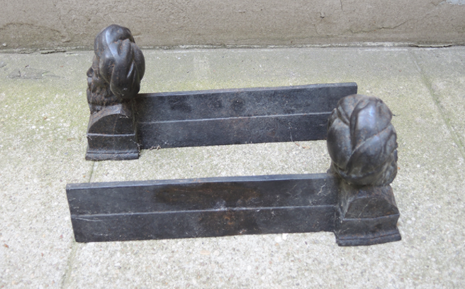 Pair of men's cast iron channels with turban