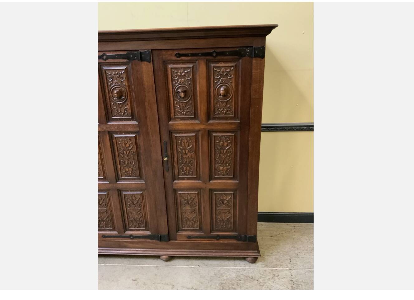 Antique neo-Gothic wardrobe with linen drawers.