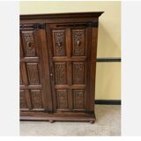 Antique neo-Gothic wardrobe with linen drawers.