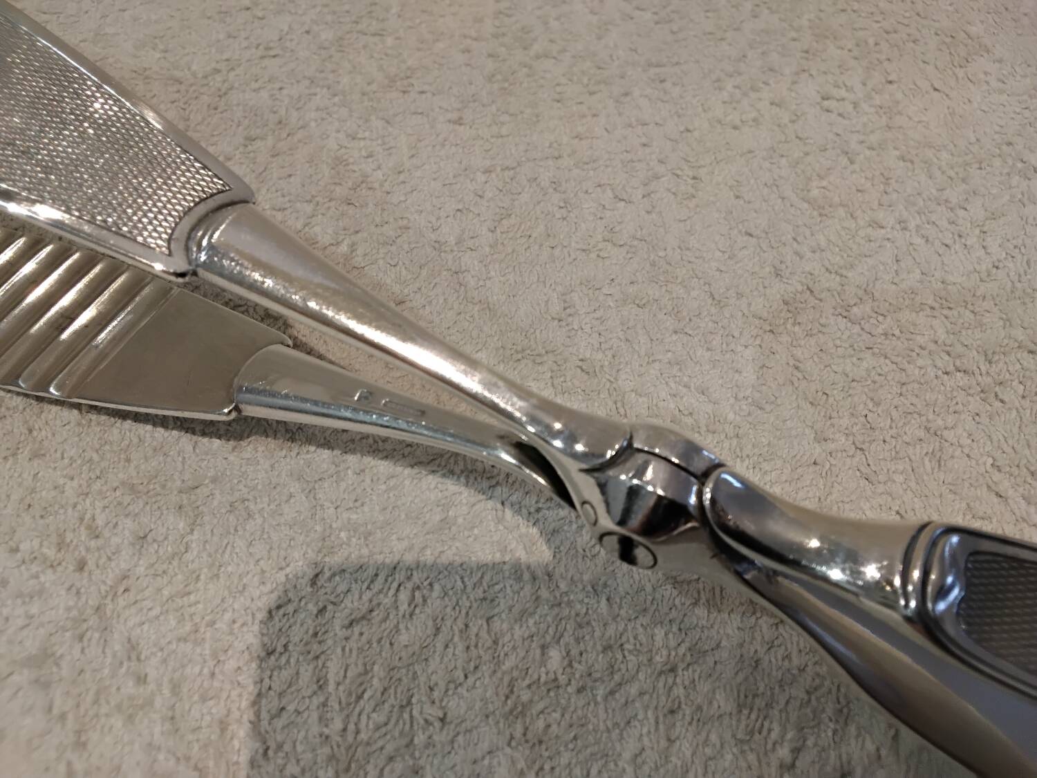 Silver-plated asparagus tongs with guilloche decoration and goldsmith Christofle