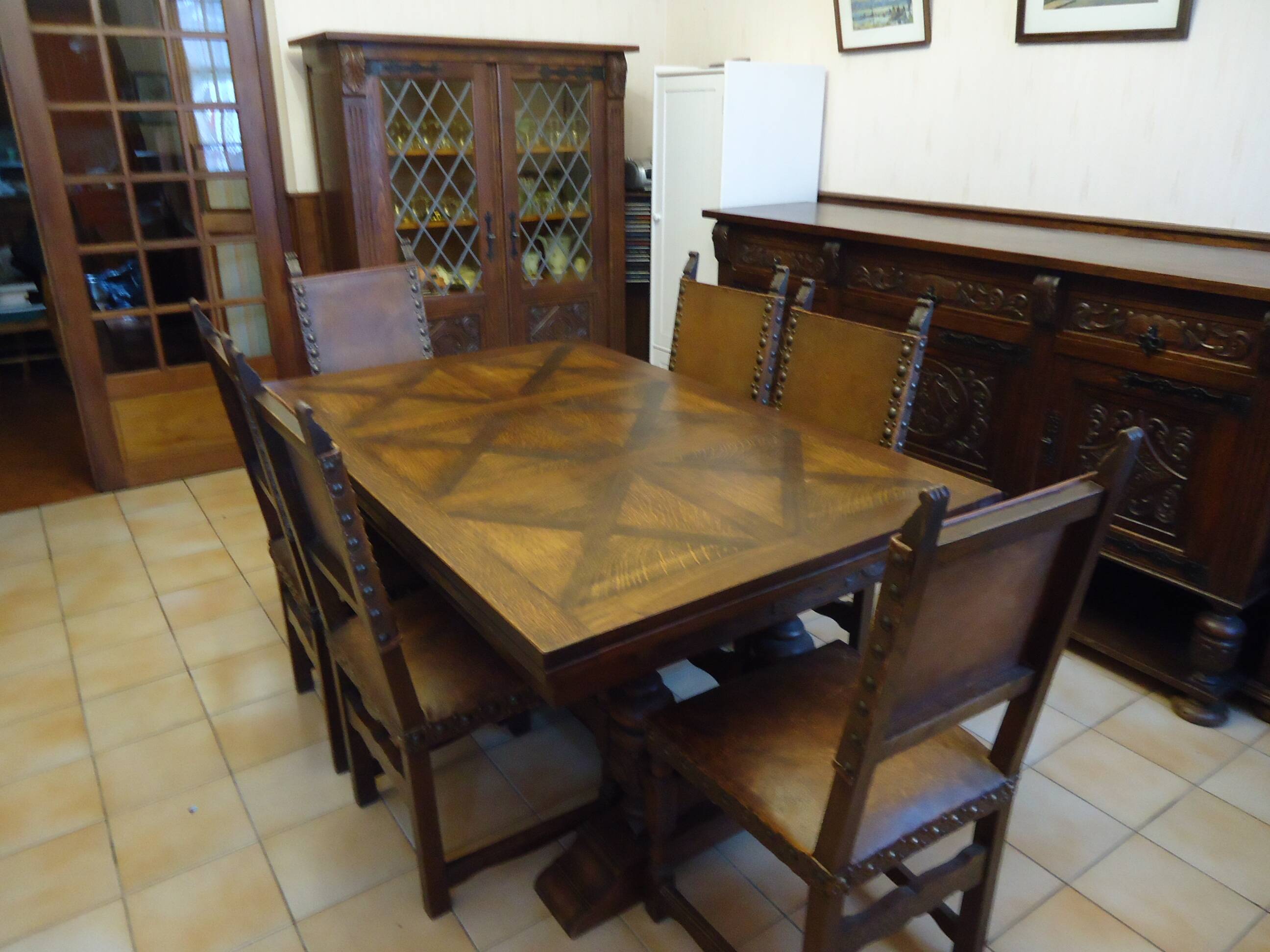 Dining table and 6 solid wood chairs from the 1950s.