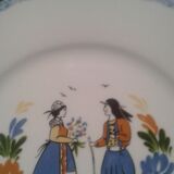 2 plates representing a couple of Bretons