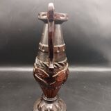 Carved wood amphora vase varnished