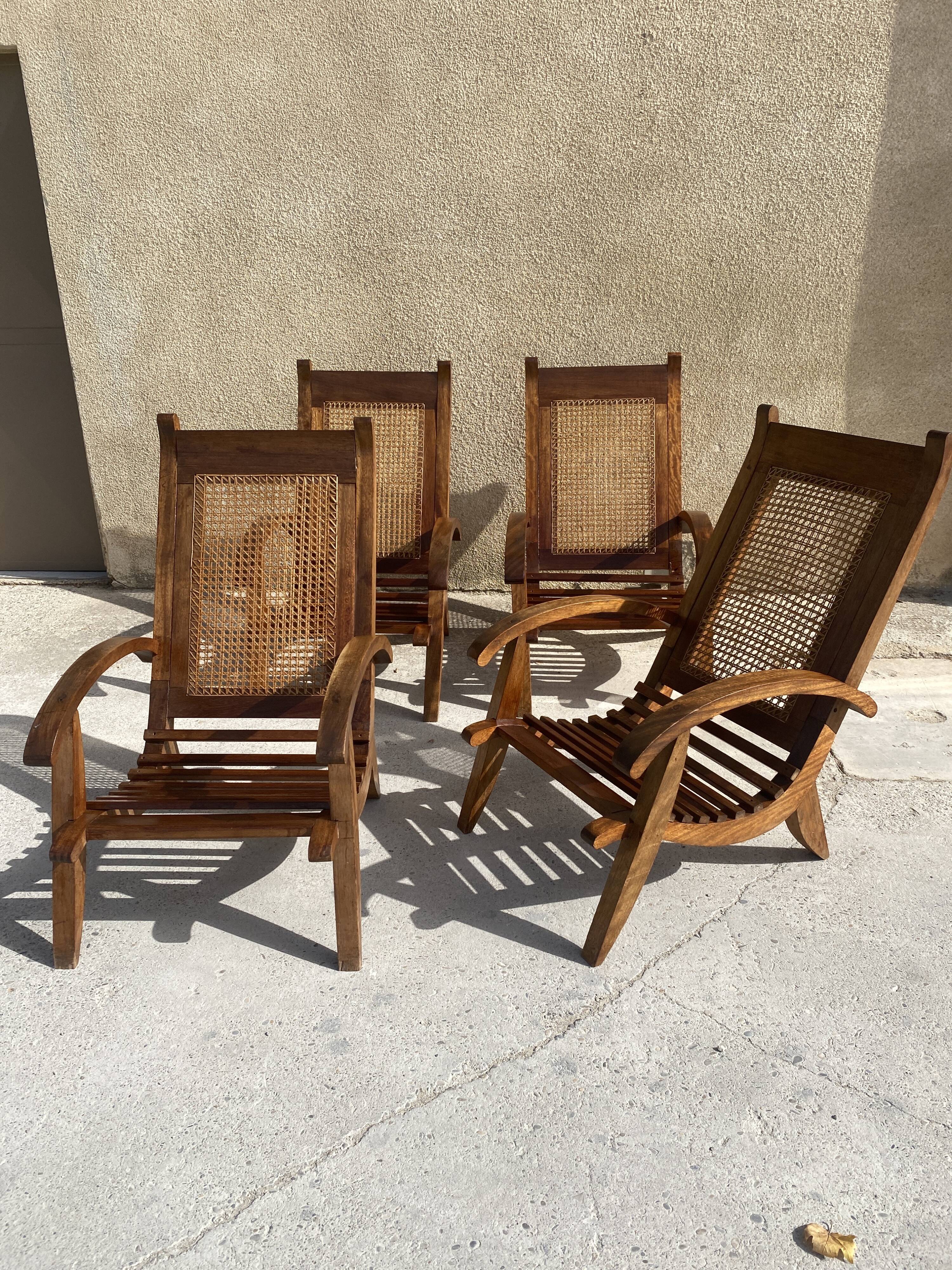 Set of 4 vintage armchairs in cane and wooden slats 1950