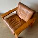 2 pine and leather armchairs from the 1970s