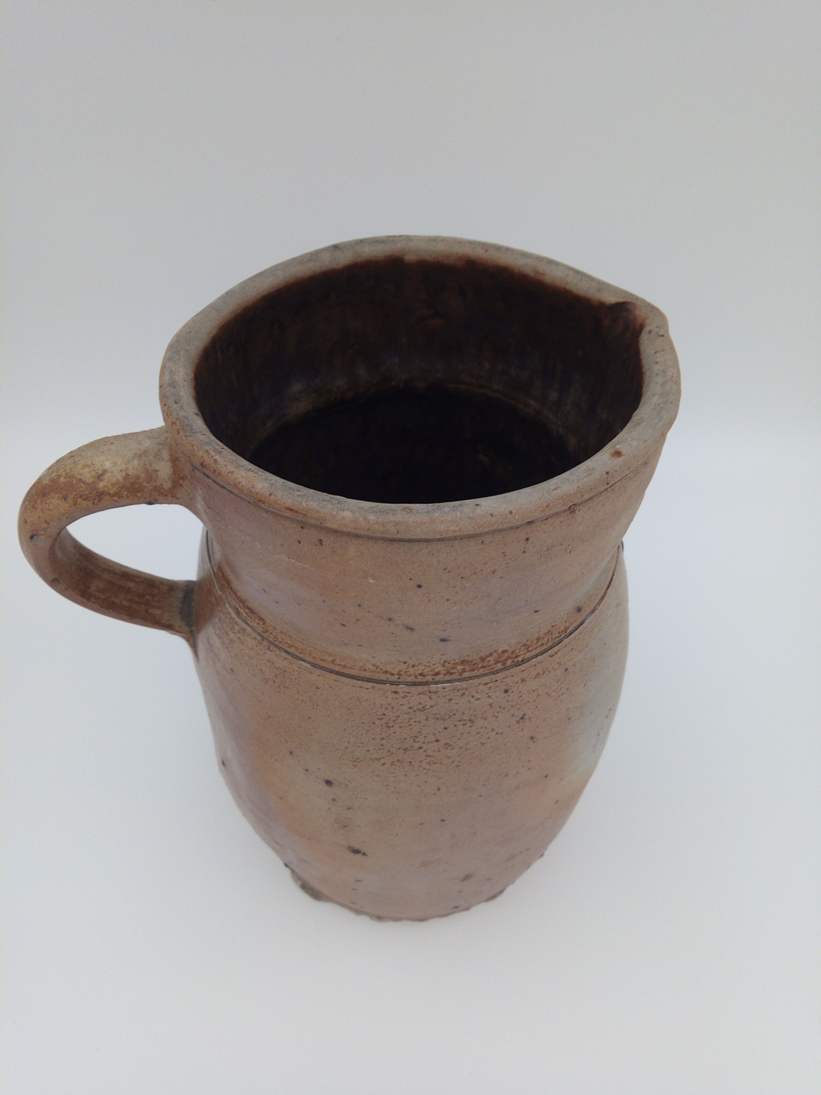 Pitcher in folk art sandstone