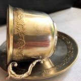 Silver metal cup and saucer