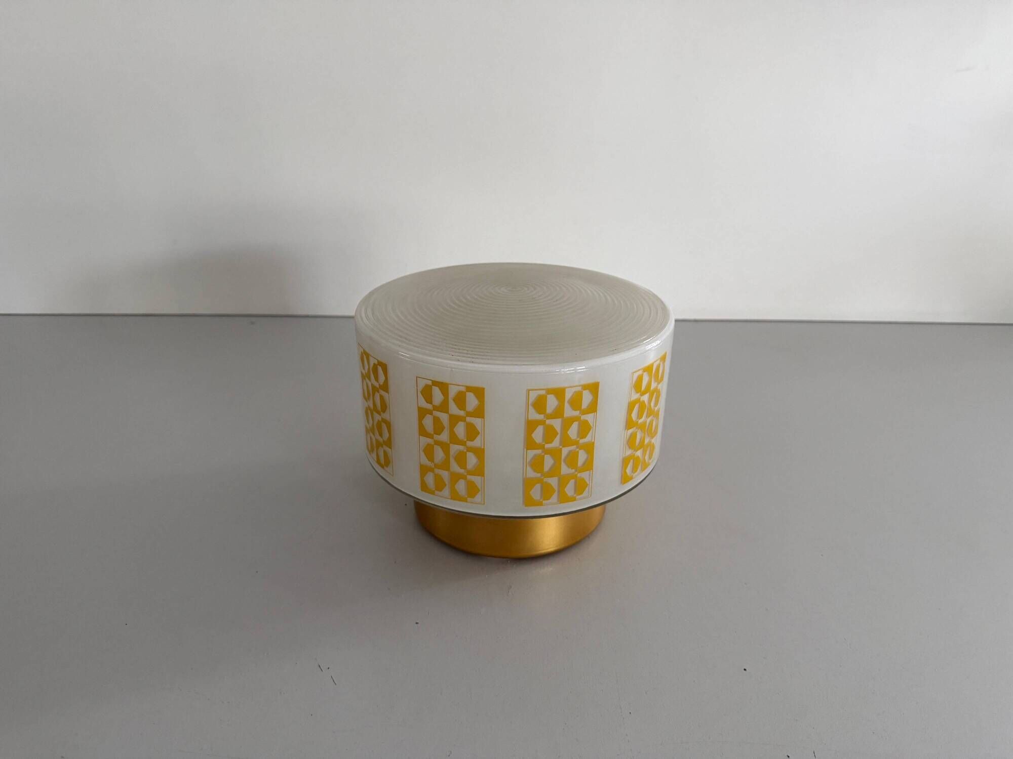 Ceiling light or wall sconce in opal glass with yellow decorations by VEB, 1950s, Germany.