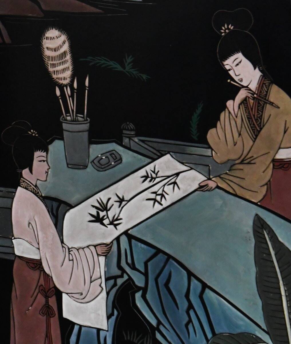 Four-panel lacquered wooden screen with Coromandel decoration.