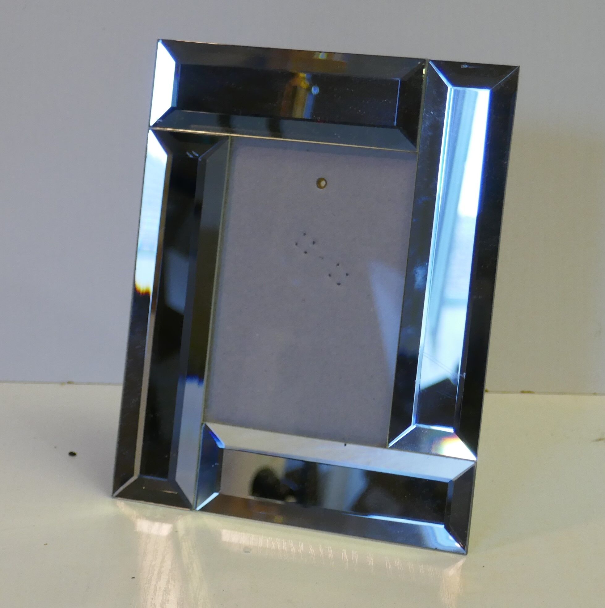 Mirrored photo holder frame