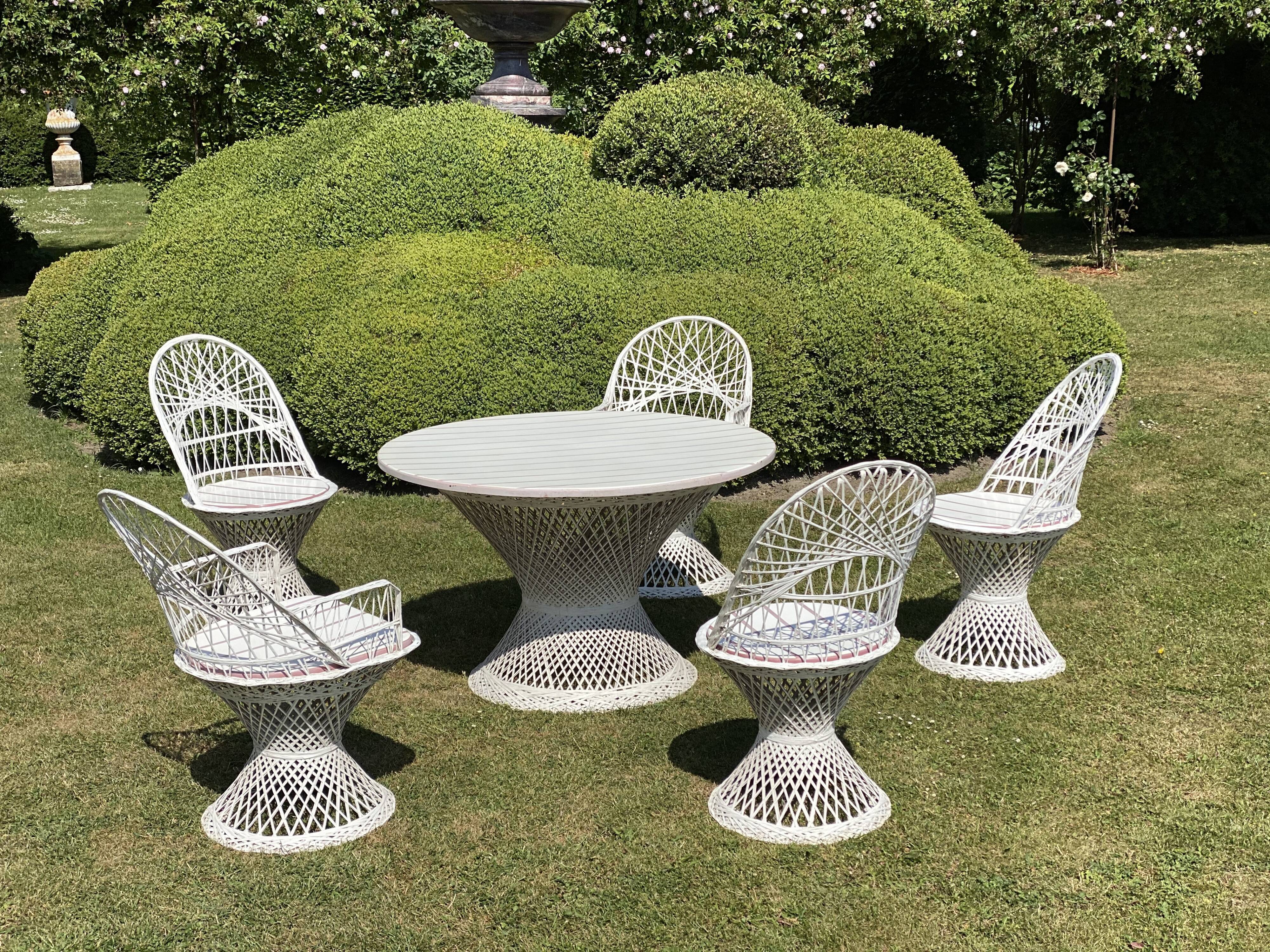 all of garden with three chairs a table and two chairs 80s