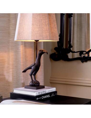 Pair of patinated bronze table lamps depicting a falcon