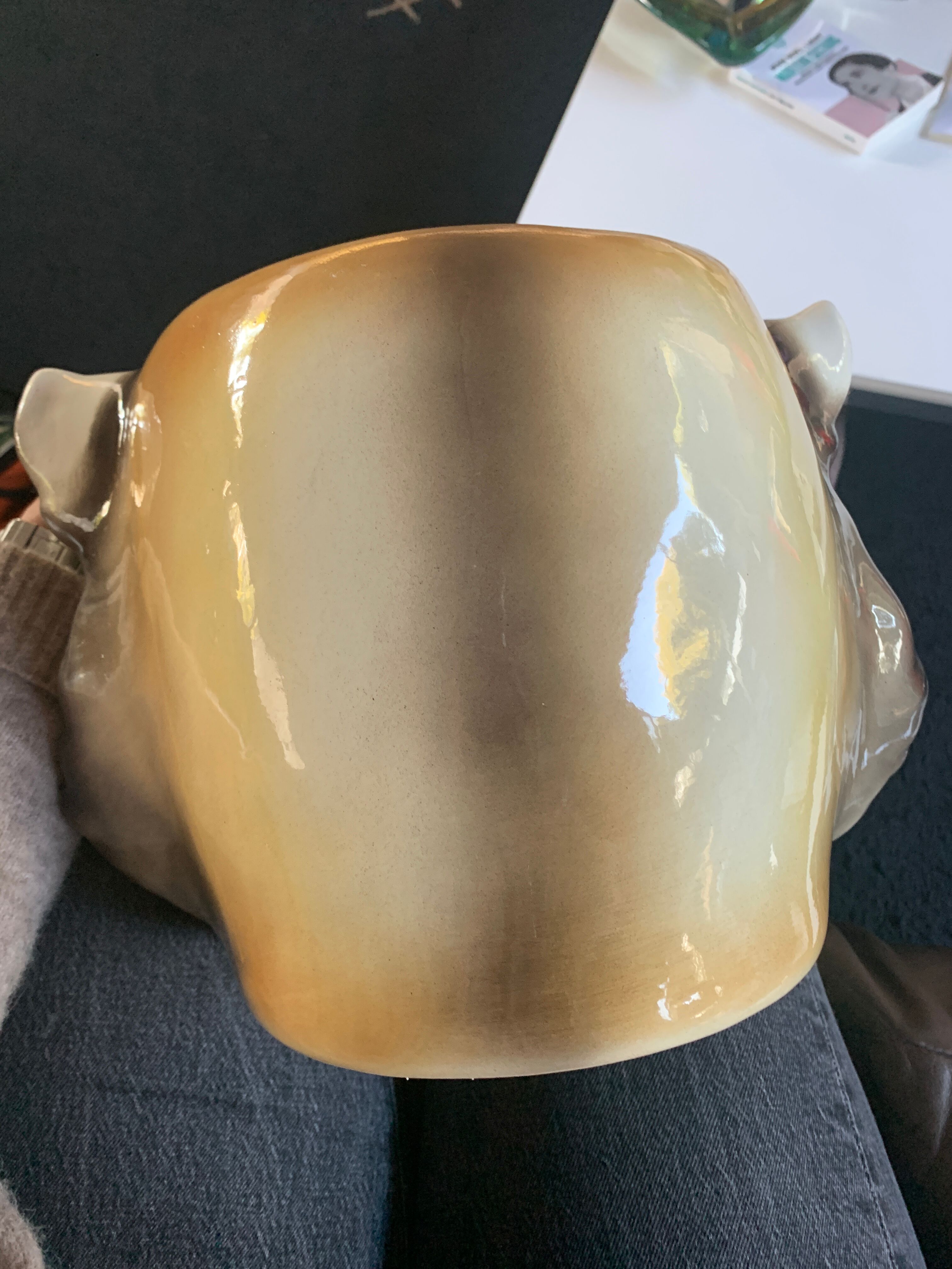 Lion's head pot cover in earthenware