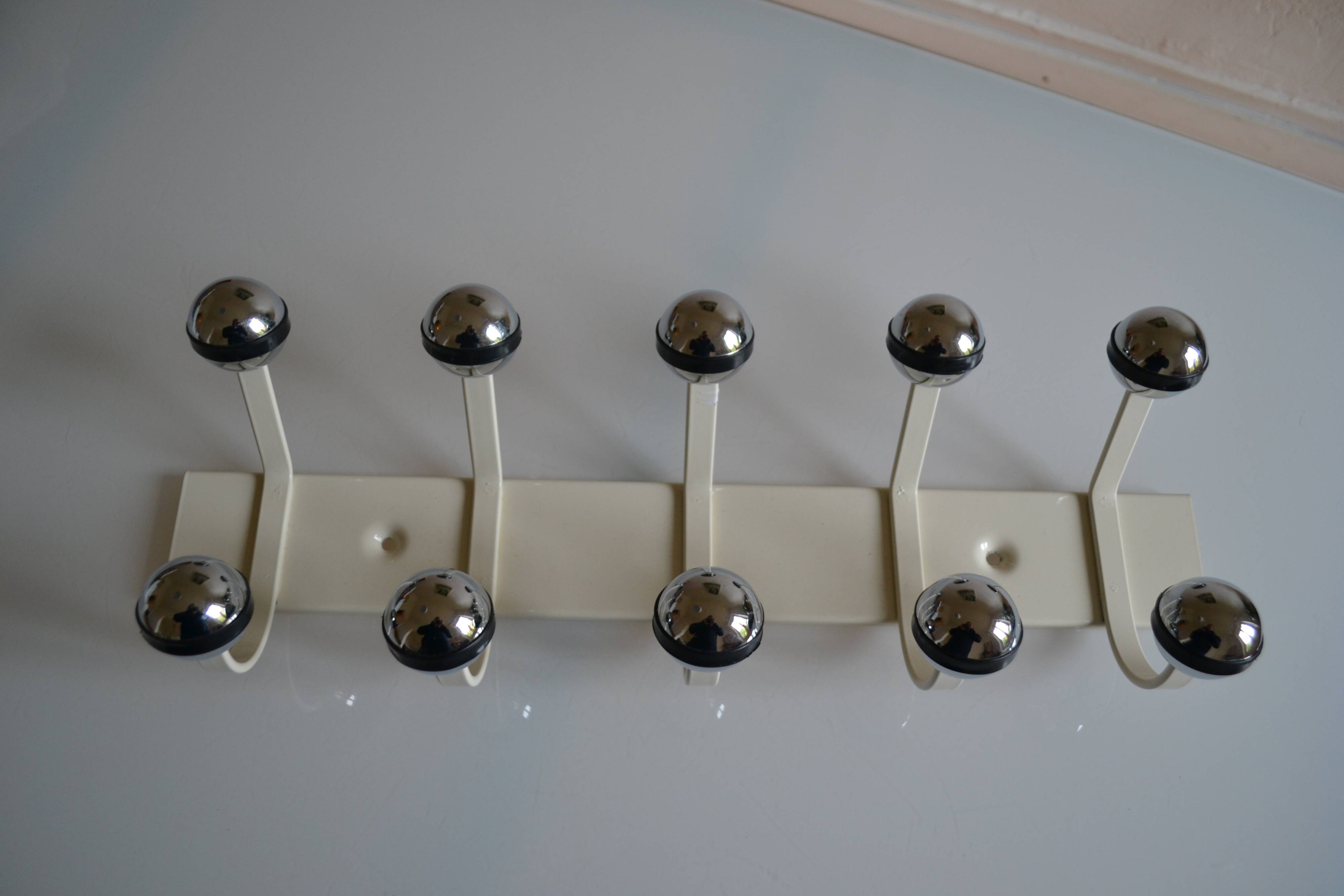 Vintage 1970s wall-mounted coat rack with 10 hooks