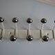 Vintage 1970s wall-mounted coat rack with 10 hooks