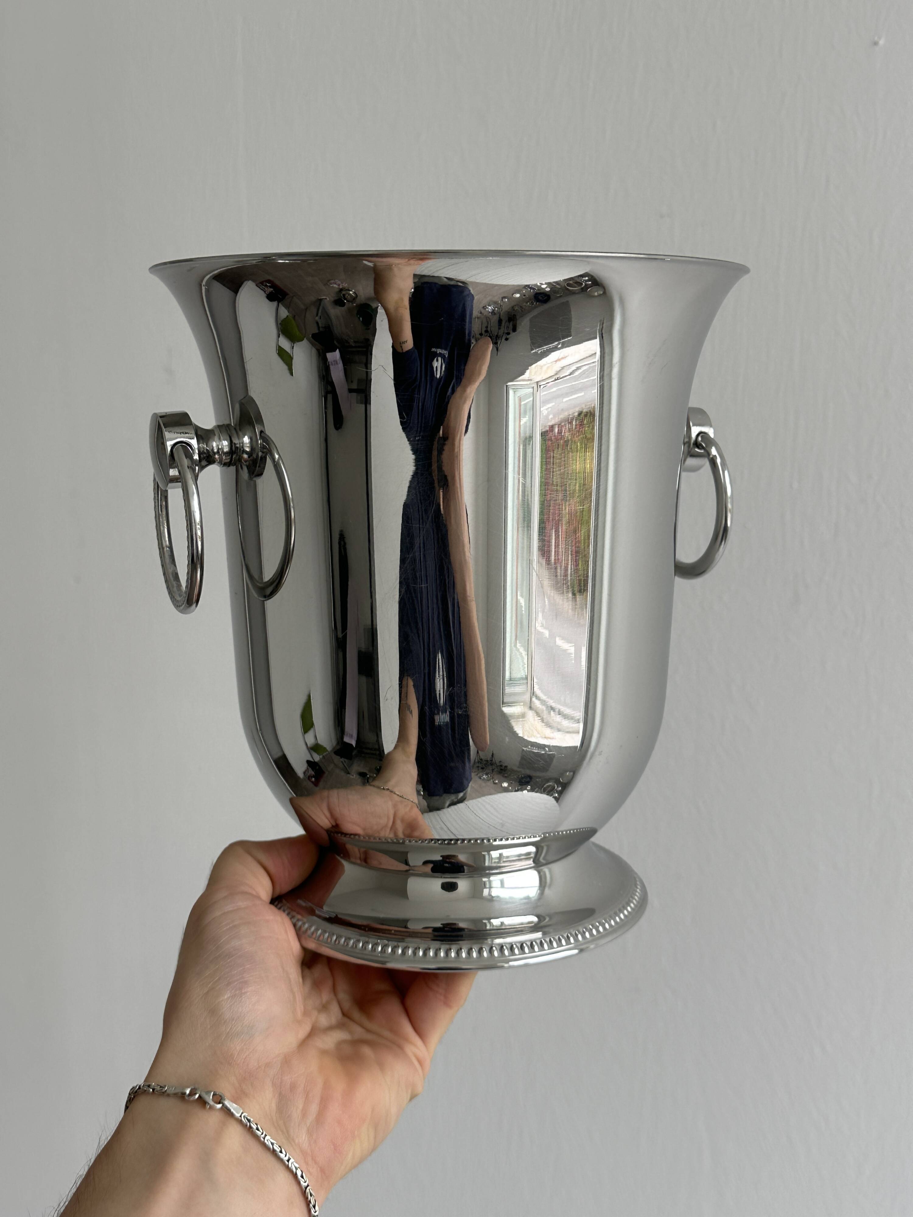 Shiny silver metal champagne bucket
