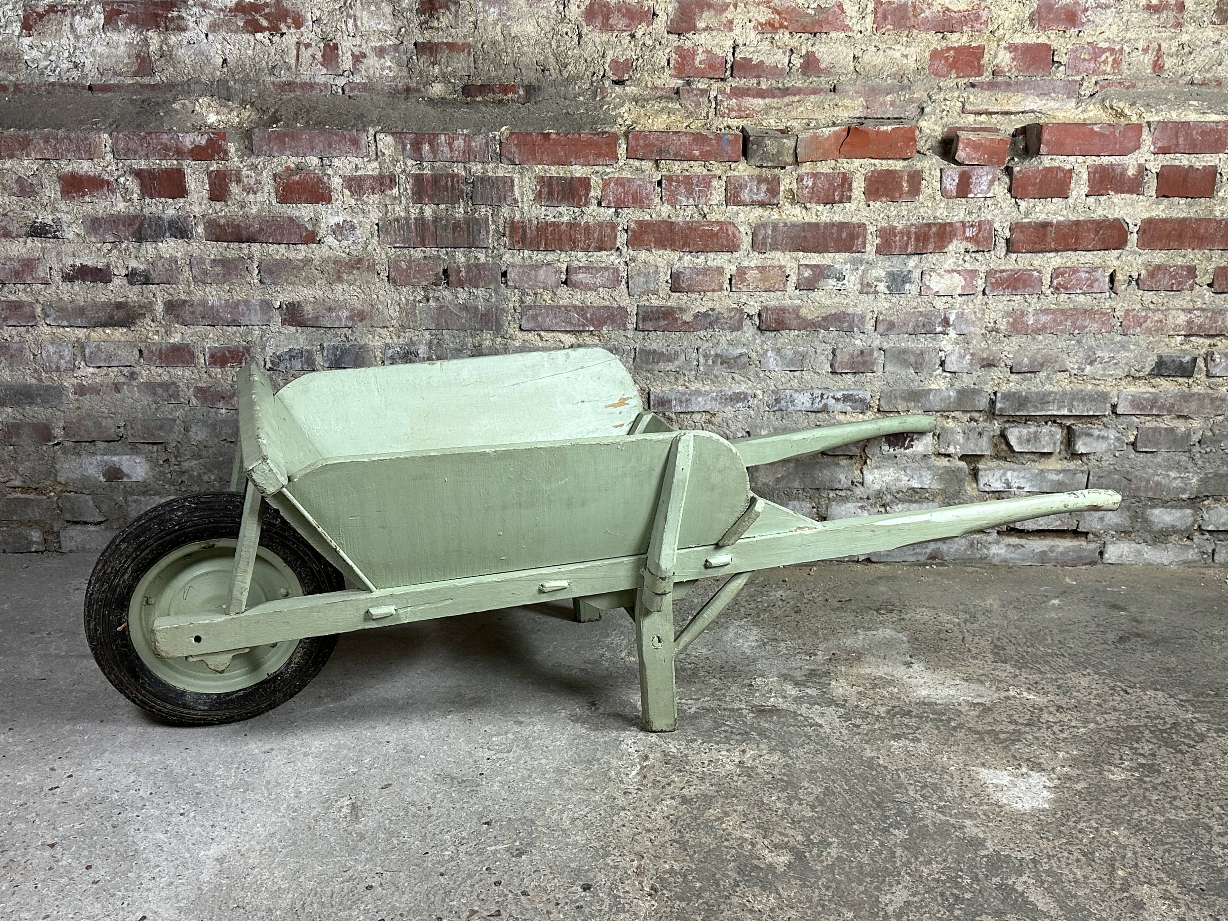 Antique wooden wheelbarrow