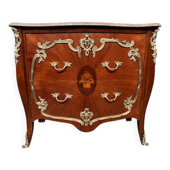 Louis XV style commode. Marquetry, gilded bronze decoration.