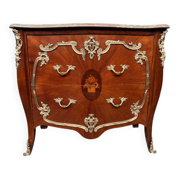 Louis XV style commode. Marquetry, gilded bronze decoration.