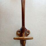 Enamelled cast iron hook