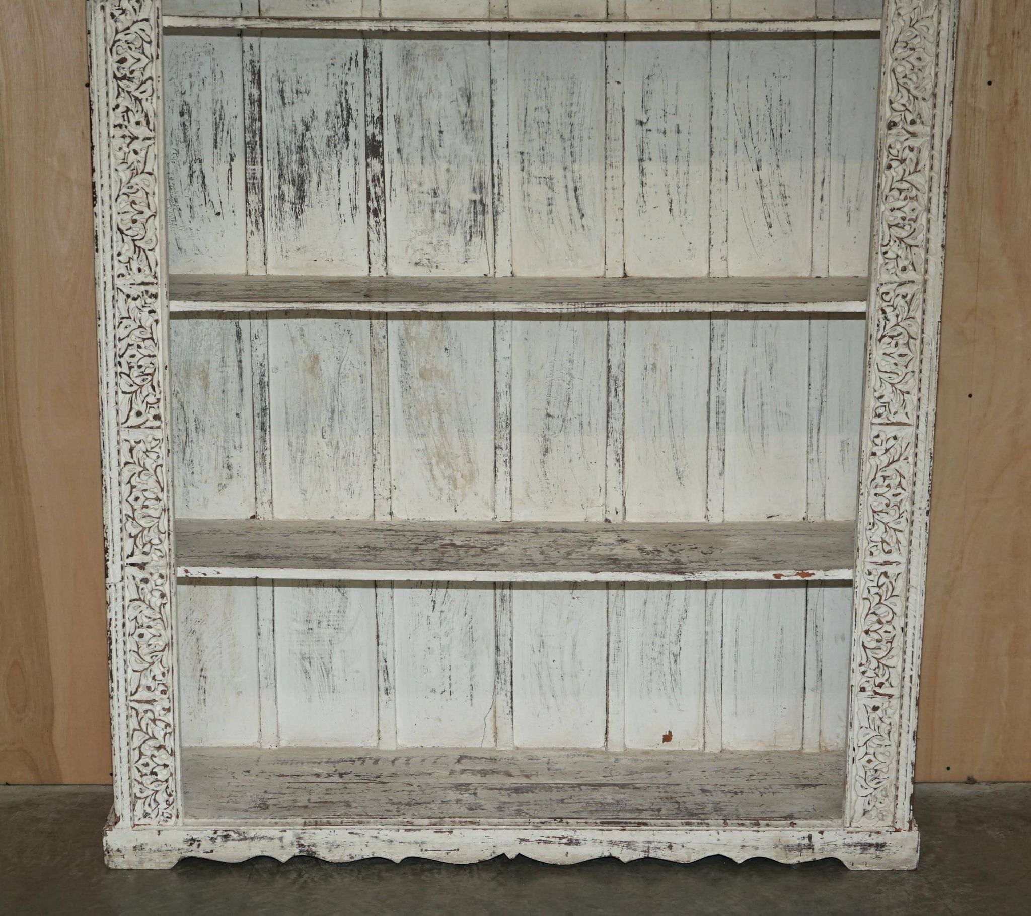 Large antique Anglo-Indian library in carved solid wood with original paint.